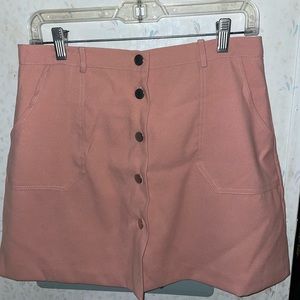 Baby pink button up mini skirt